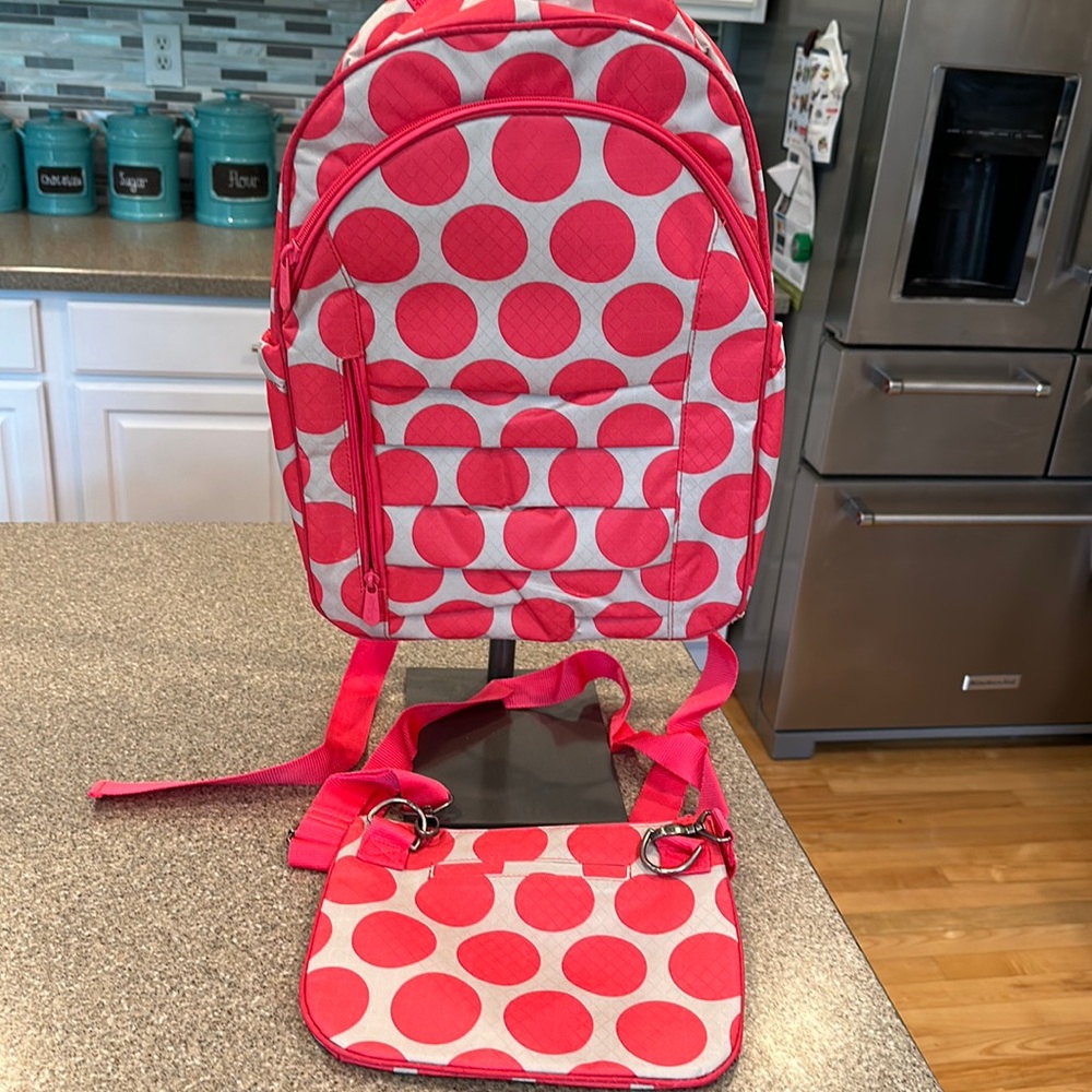 Slightly used ThirtyOne Her Deluxe Backpack with matching crossbody purse